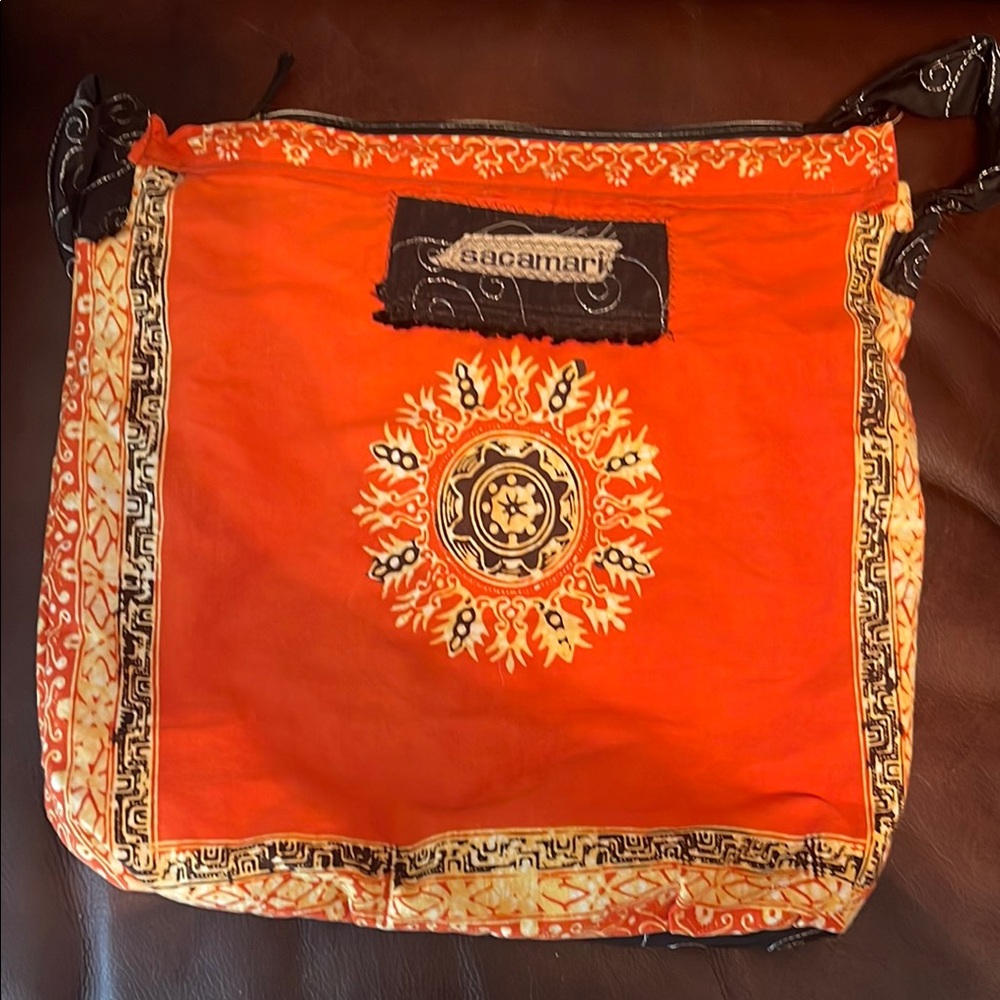 Vibrant Orange Shoulder Bag with Embellishments